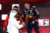 ABU DHABI, UNITED ARAB EMIRATES - NOVEMBER 26: Race winner Max Verstappen of the Netherlands and Oracle Red Bull Racing celebrates on the podium during the F1 Grand Prix of Abu Dhabi at Yas Marina Circuit on November 26, 2023 in Abu Dhabi, United Arab Emirates. (Photo by Clive Rose/Getty Images) // Getty Images / Red Bull Content Pool // SI202311260259 // Usage for editorial use only //